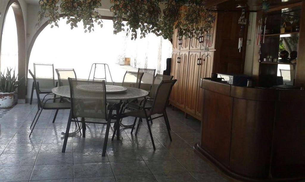 Casa à venda com 6 quartos, 720m² - Foto 7